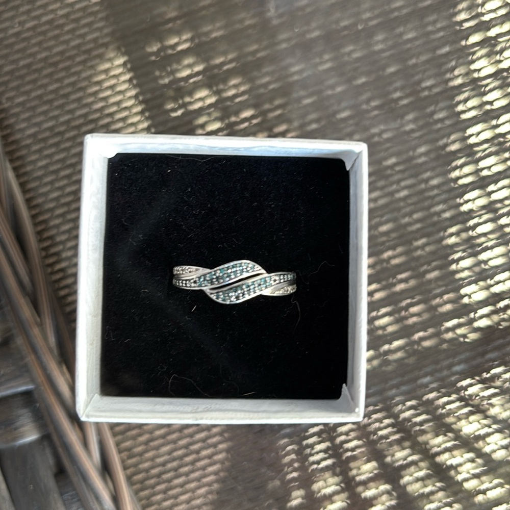 -  Sterling silver ring with blue and white diamonds